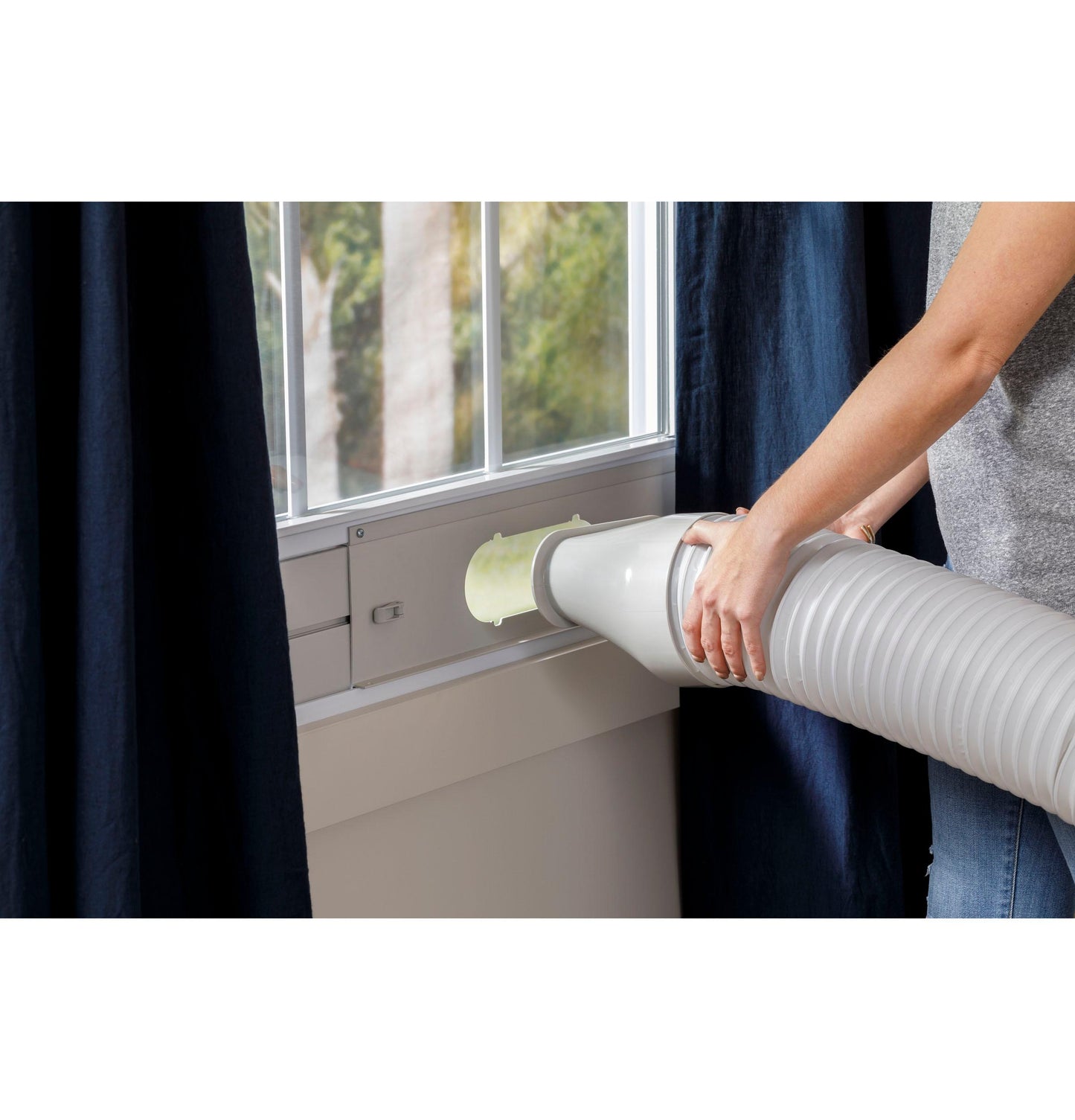 GE APPLIANCES APSA13YBMW GE(R) 14,000 BTU Heat/Cool Portable Air Conditioner for Medium Rooms up to 550 sq ft. (9,950 BTU SACC) - APSA13YBMW-KT